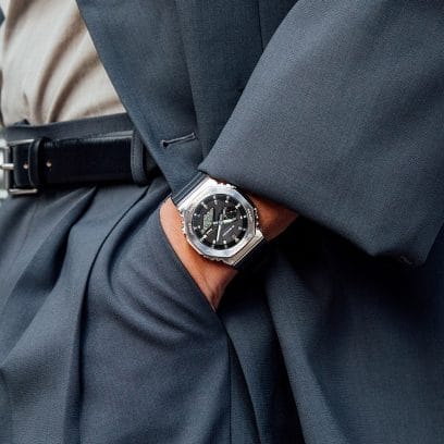 G-SHOCK GBM2100-1A stainless-steel watch on person’s wrist denoting style