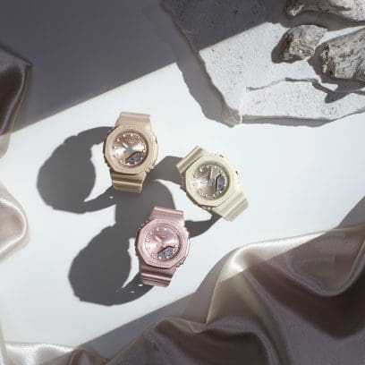 Three watches on a table with stylistic lighting. From left: GMA-P2100ST-9A, GMA-P2100ST-4A, GMA-P2100ST-7A