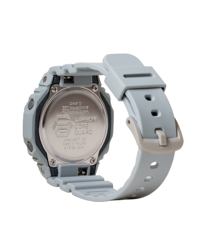 Side/back profile view of the G-SHOCK GMA-S2100NC-8A digital-analog watch in grey with purple face.
