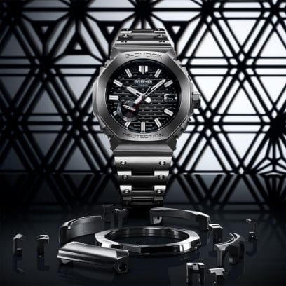 Silver G-SHOCK MRGB2100D-1A watch front view with latticework background denoting kigumi-inspired style