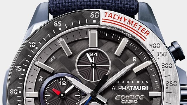 Nahaufnahme auf den Tachymeter-Schriftzug der Lünette