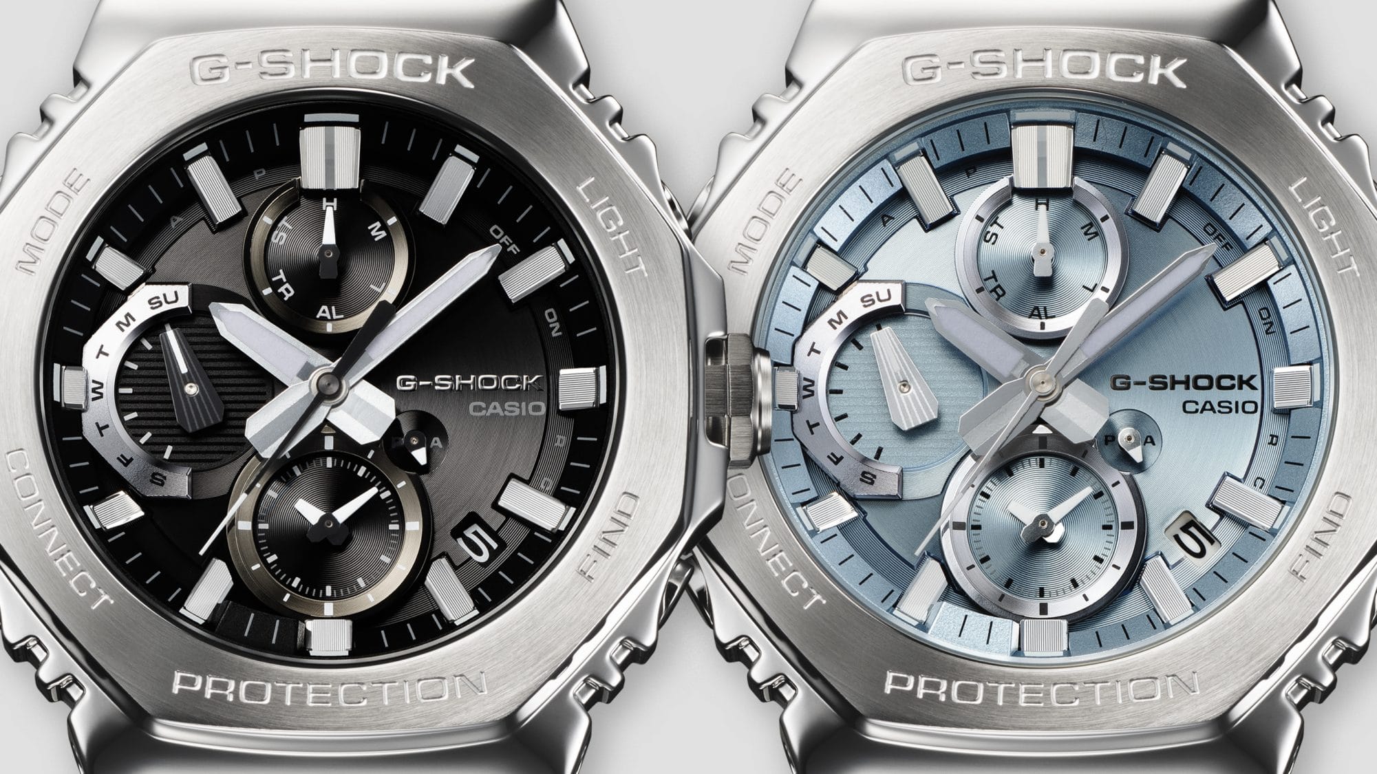 Die Zifferblätter der beiden Casio G-Shock Edelstahlchronographen GMC-B2100D-1A und GMC-B2100AD-2A nebeneinander 