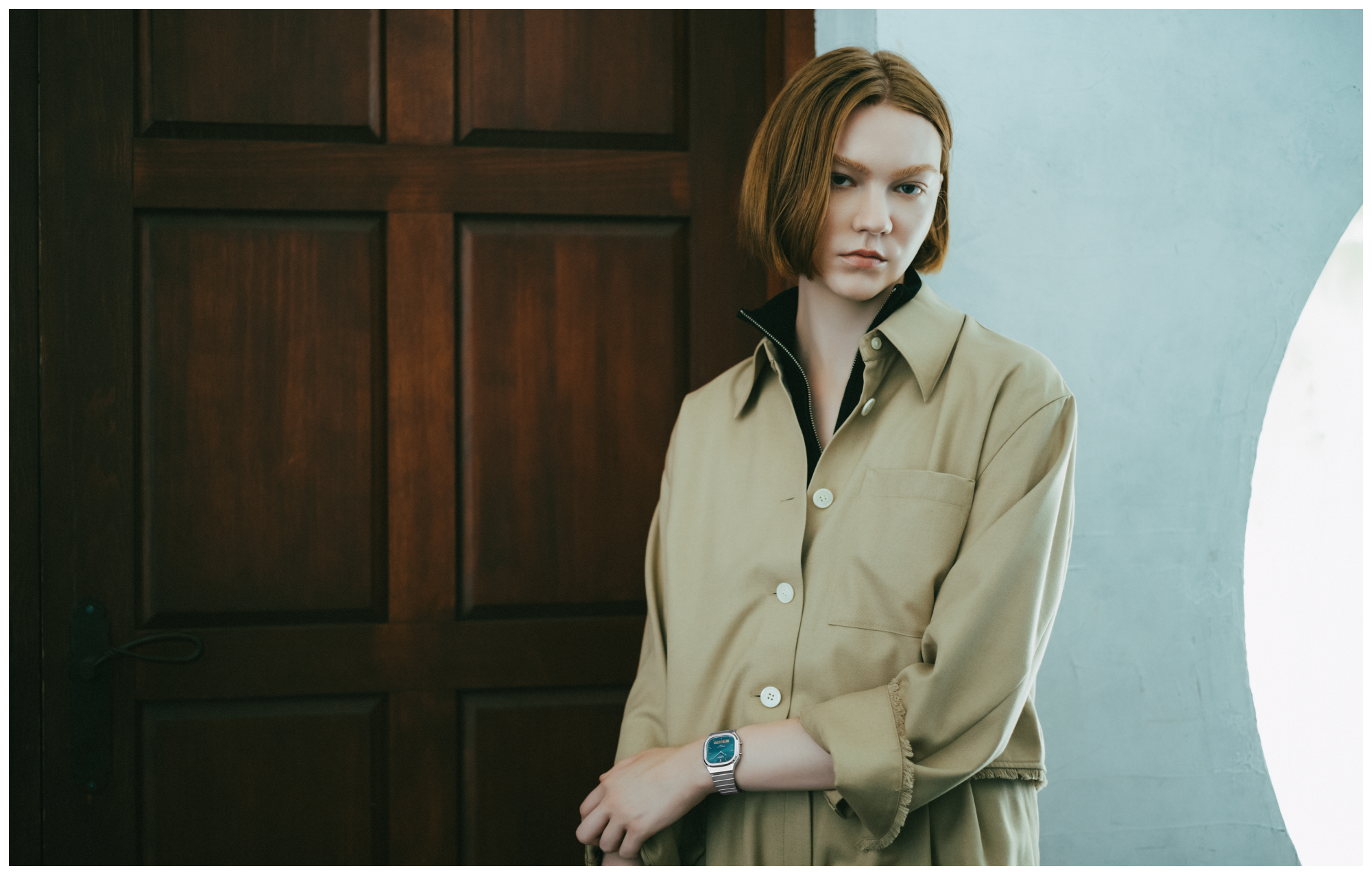 Image of a woman posing while wearing the AQ-240E-3A.