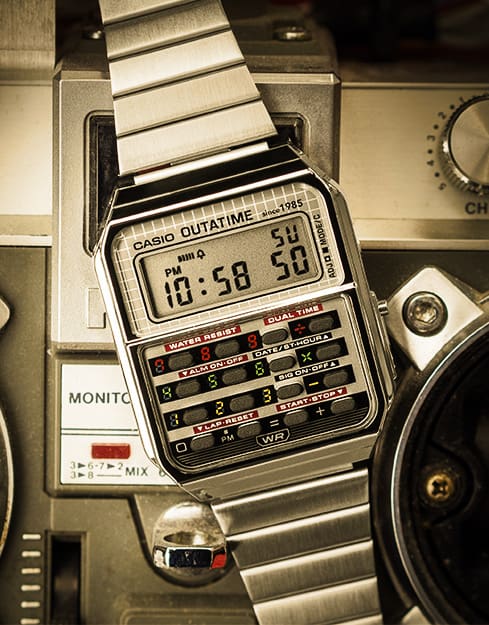 The silver wristwatch CA-500WEBF-1A on the centre control of the DeLorean