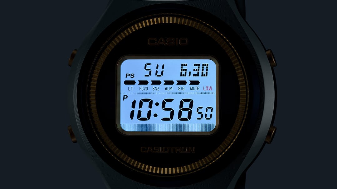 The brightly lit display of the TRN-50SS-2A digital watch in the dark