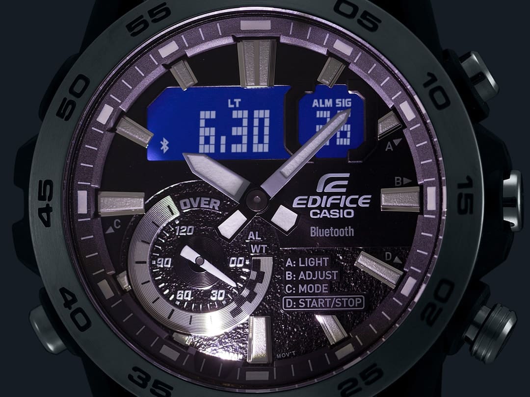 Close-up of the ECB-40P-1A dial in the dark with dual LED illumination