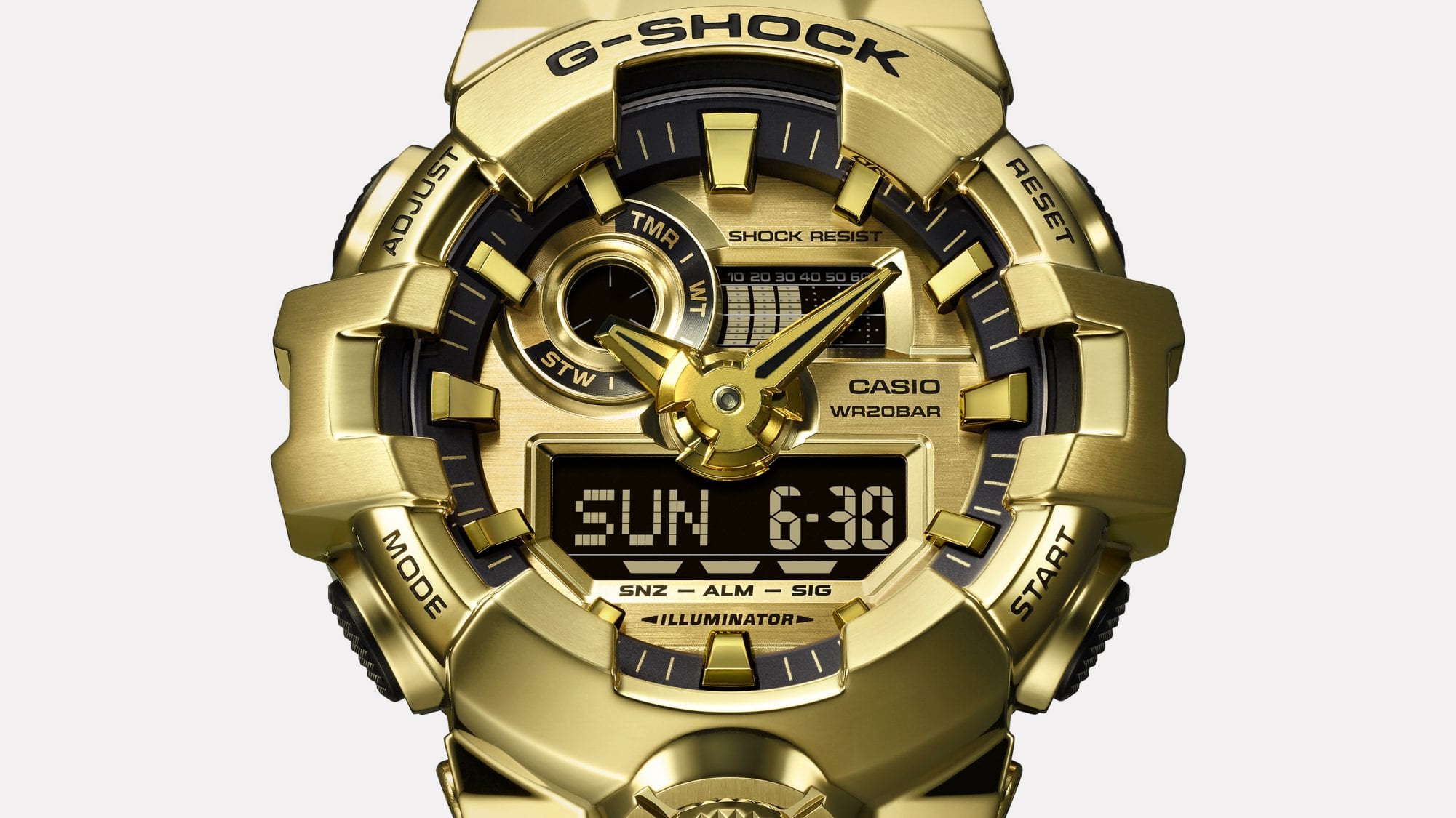Close-up of the display of an all-gold Casio G-Shock GM-700 wristwatch
