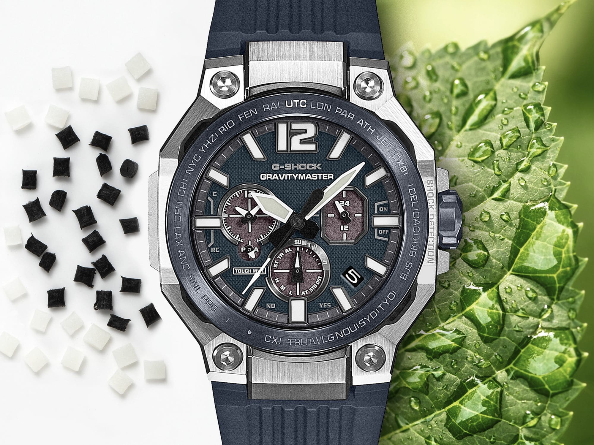 GWR-B3000 watch displayed beside bio-based resin pallets and a green leaf.