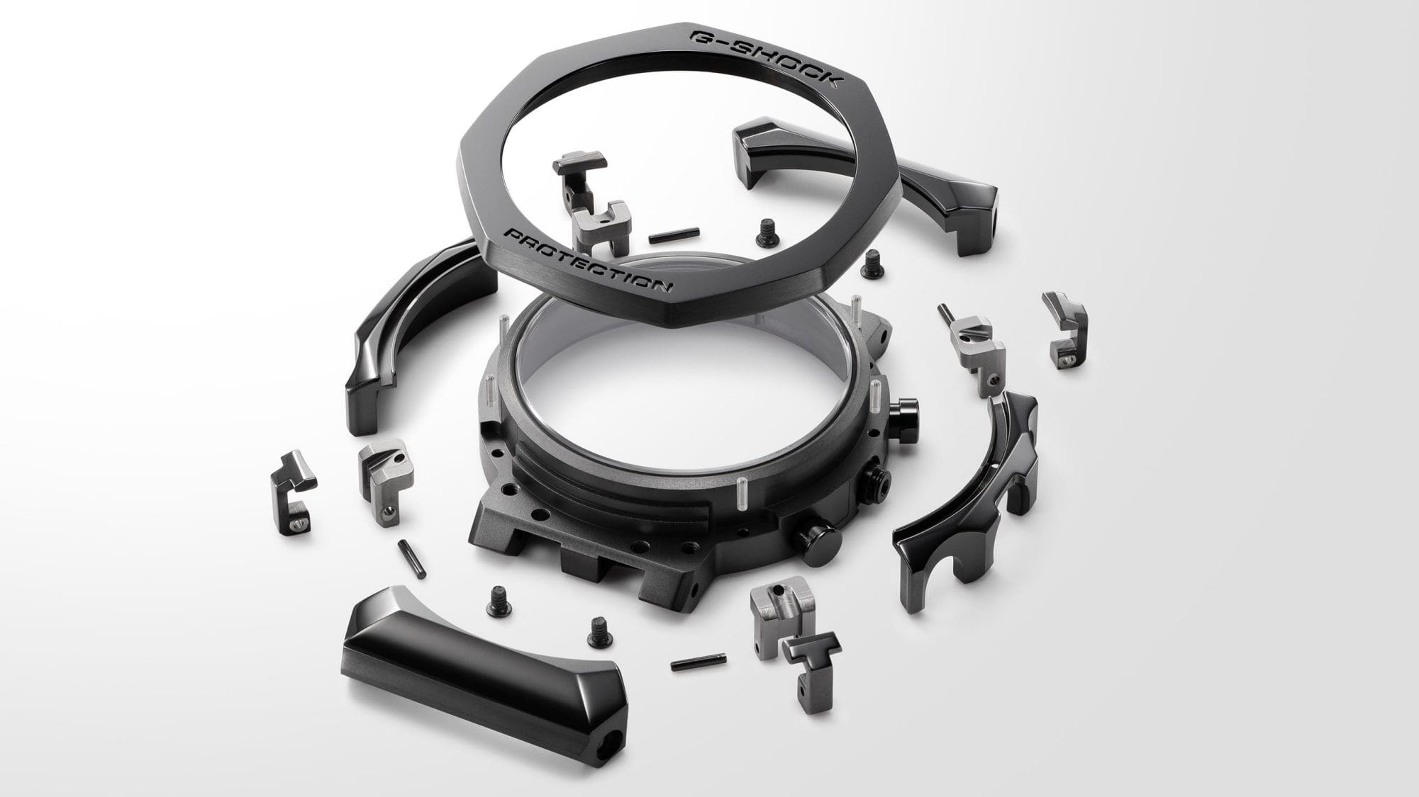 Disassembled outer case of the MRG-B2100B wristwatch on a white background.