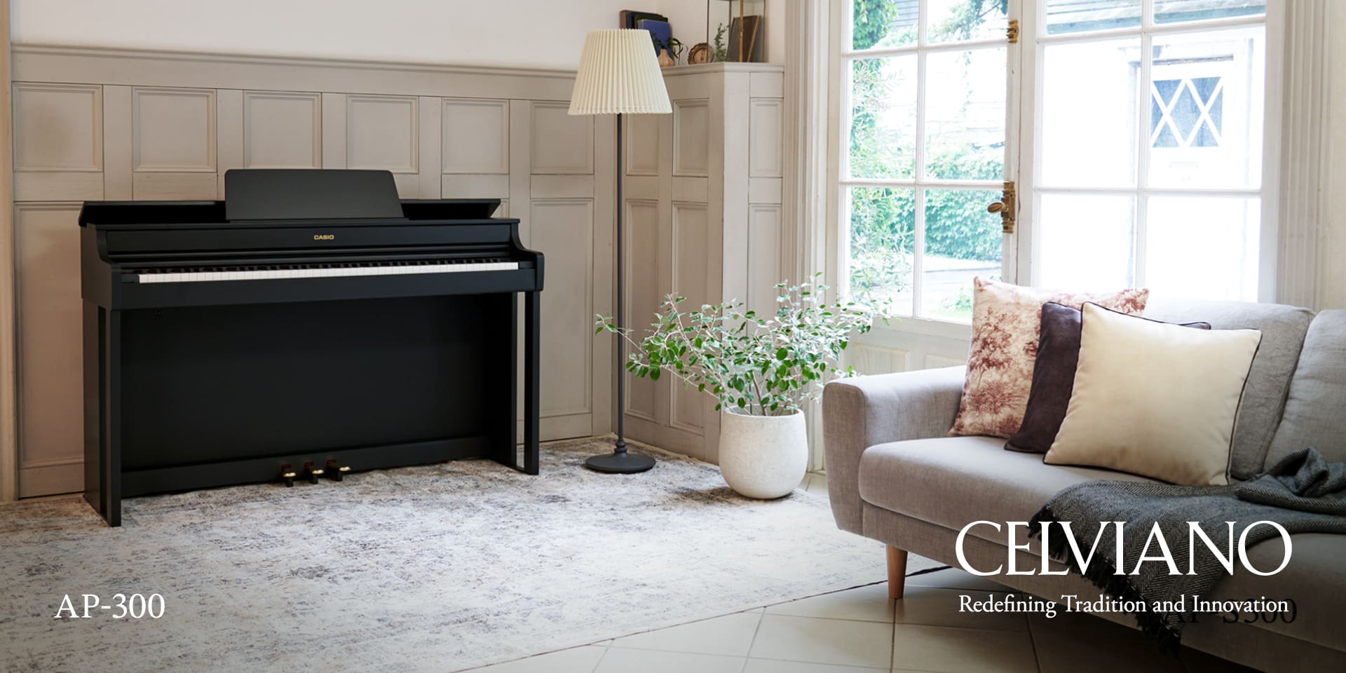 The white Celviano AP-300 on the wall of a comfortably furnished living room. The words ‘Celviano - Redefining Tradition and Innovation’ complete the picture.