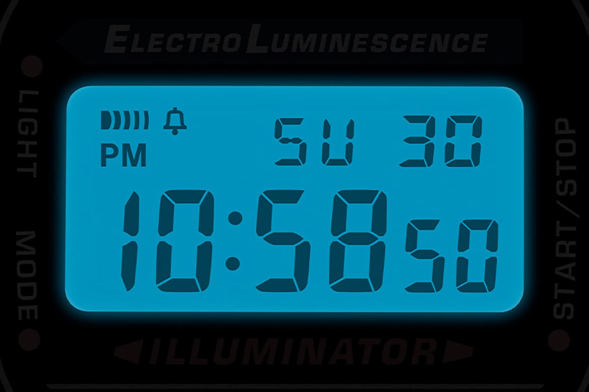 Backlit digital LCD of the Casio A168 vintage digital watch denoting EL backlight feature.
