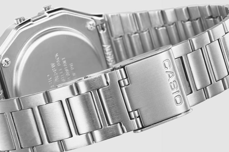 Close up of the metal band of the Casio A168 vintage digital watch denoting style and finish.