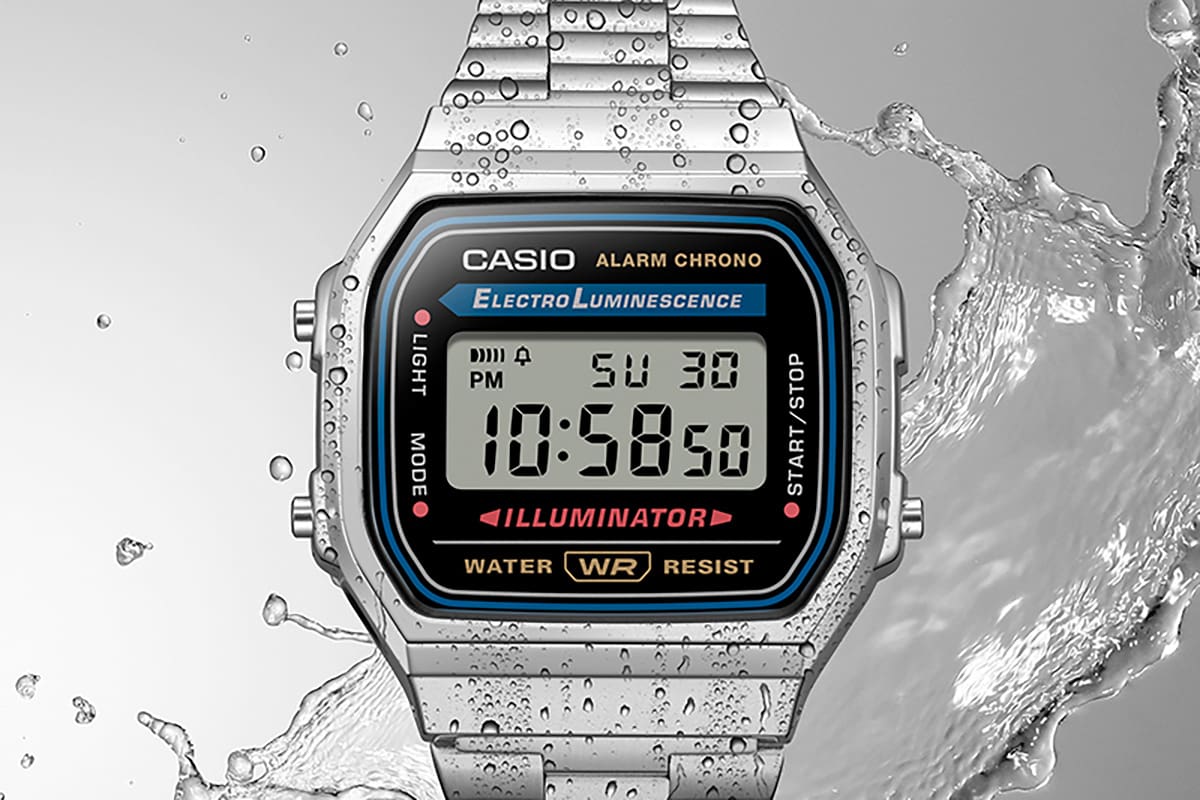 Casio A168 vintage digital watch splashed with water denoting water resistance.