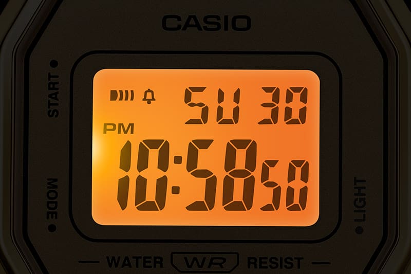 Image of the watch face with LED light on.