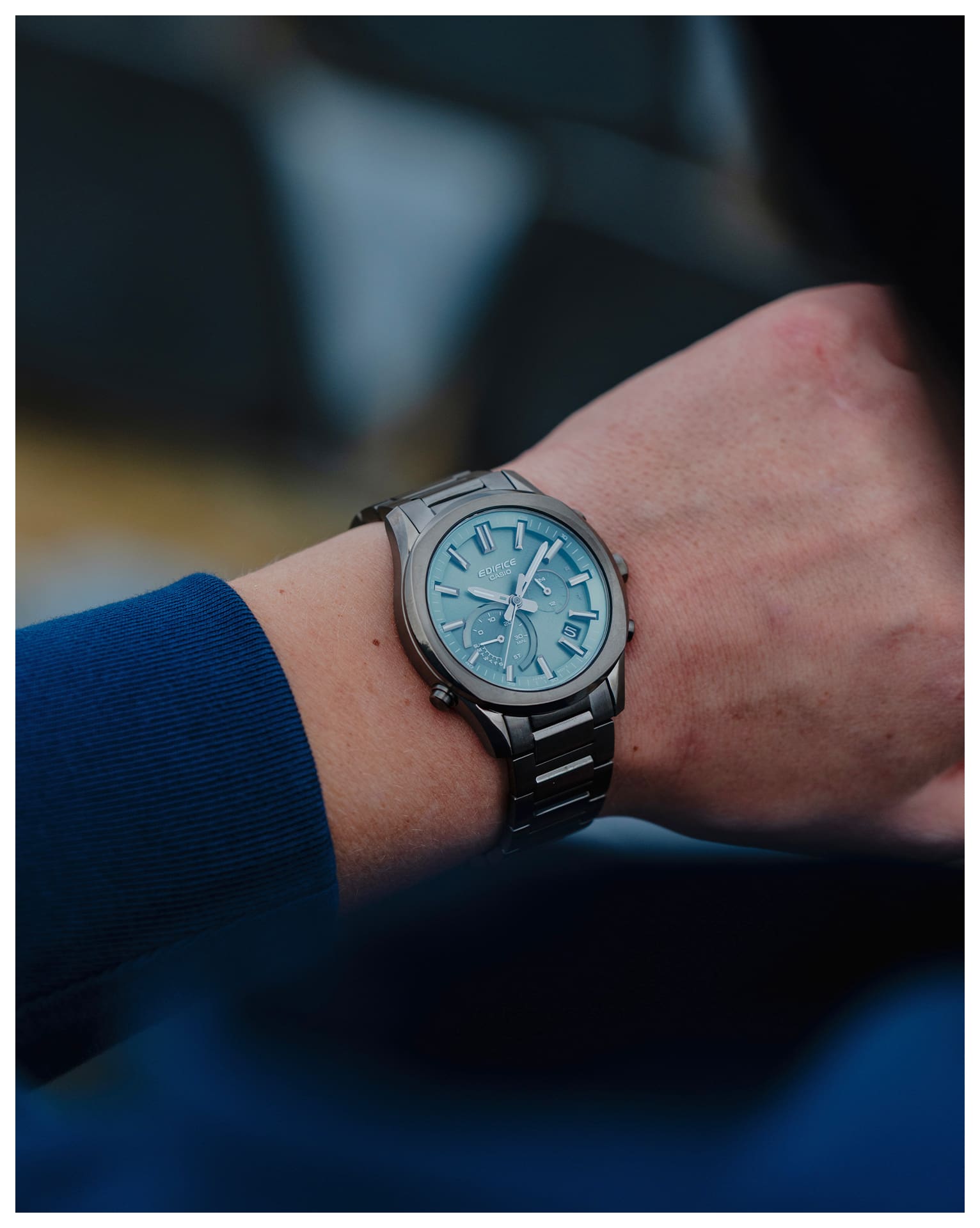 Close-up photo of the EQB-1300DC-3A worn on the wrist.