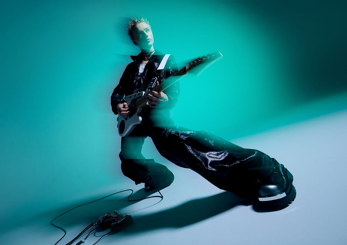 A photo of a guitarist playing