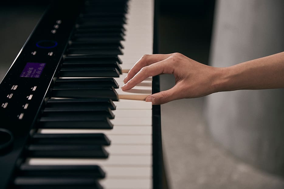 chord being played on a keyboard chord being played on a keyboard