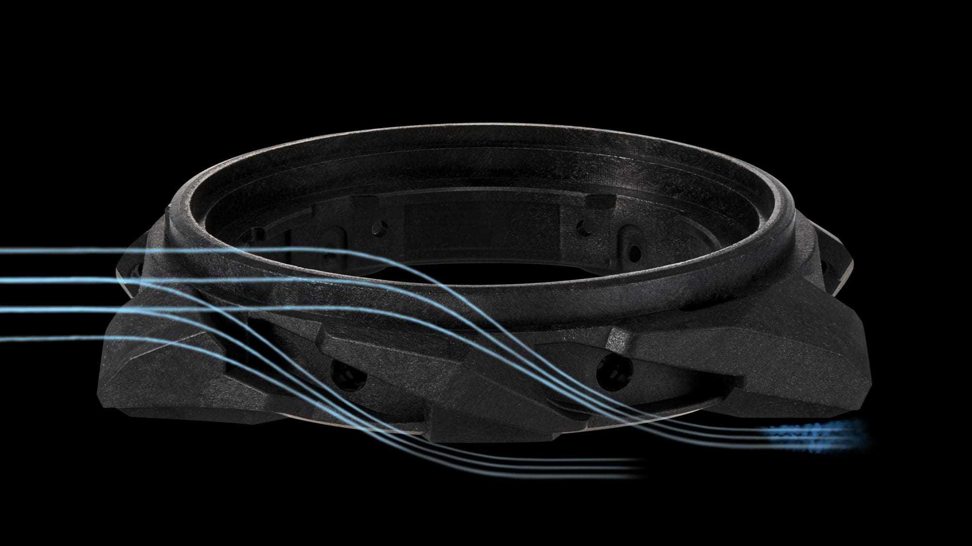 Carcasa de resina reforzada con fibra de carbono con un diseño inspirado en el flujo de aire alrededor de un auto de carreras de fórmula