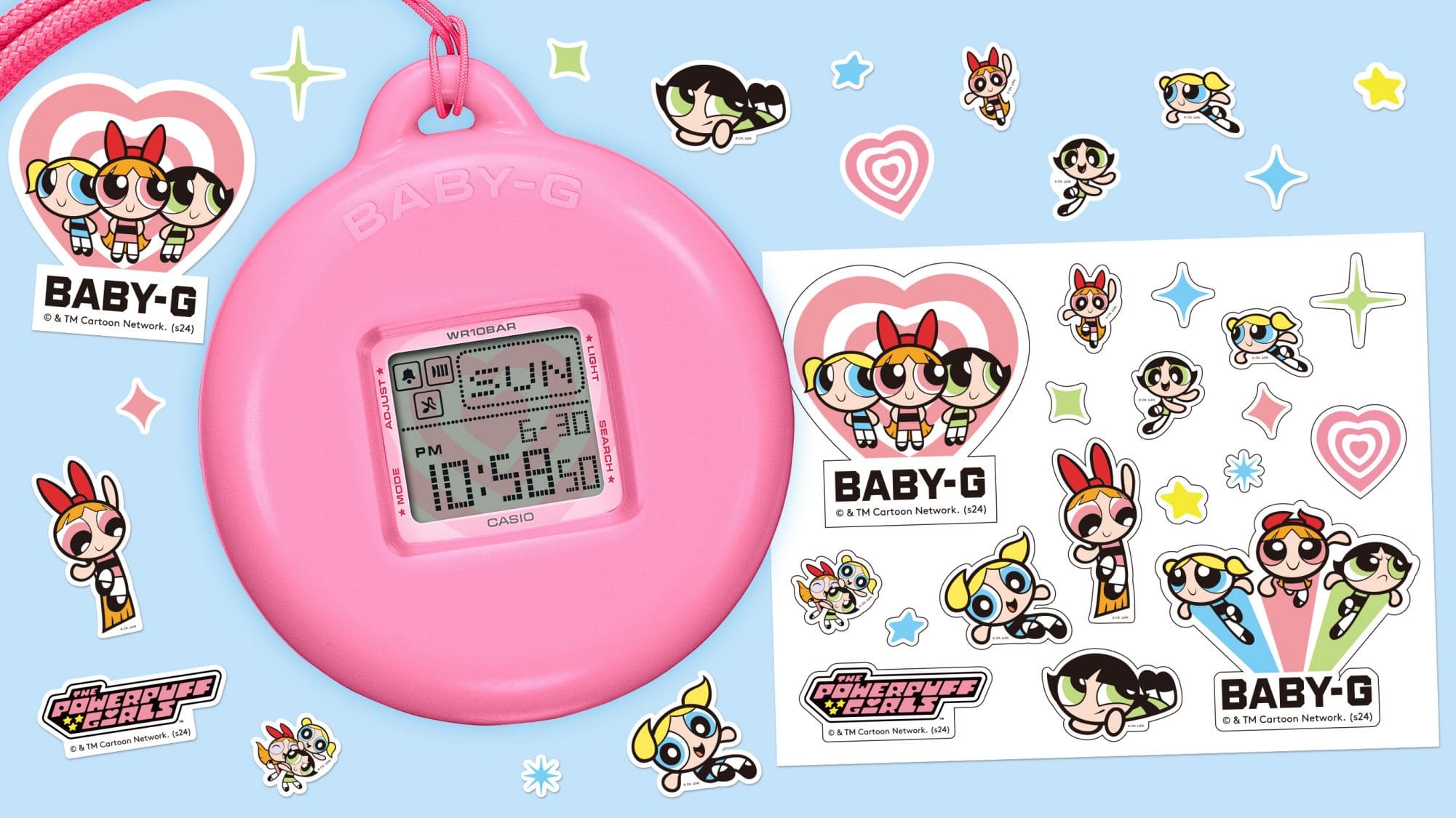 El reloj en el colgante rosa, junto a él: las pegatinas decorativas que forman parte del set