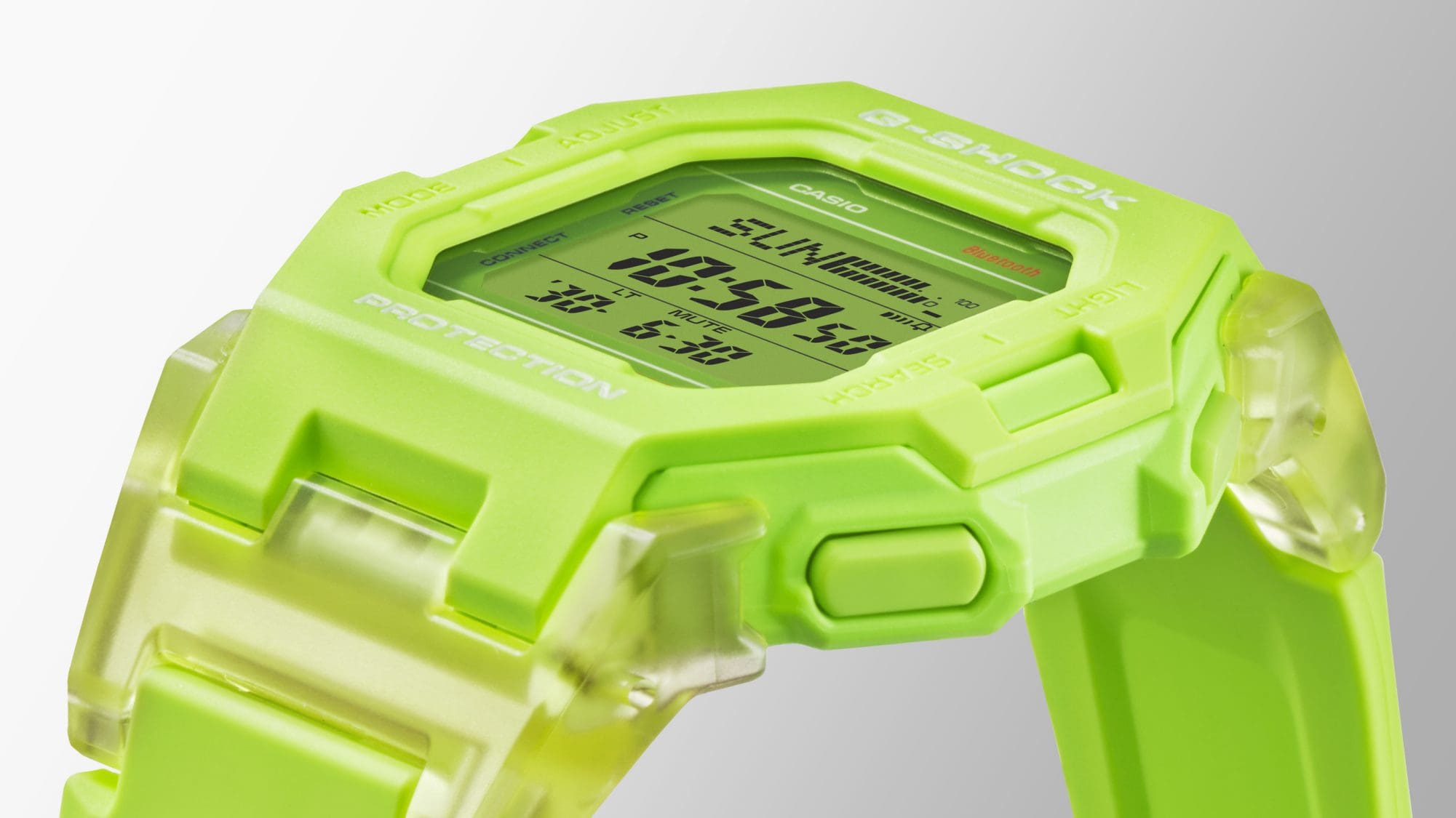Vista lateral del bisel, la carcasa y la correa del reloj Casio G-Shock GD-B500 de color verde neón