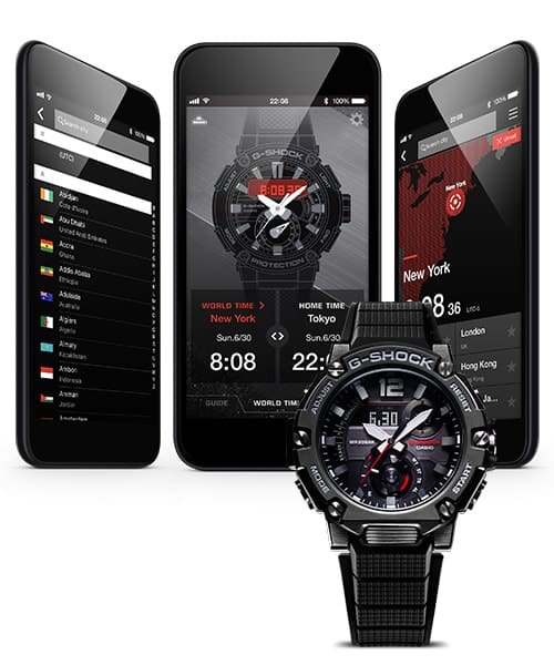 Tres smartphones con diferentes pantallas de aplicaciones conectadas a G-Shock, delante un reloj de pulsera Casio G-Steel GST-3200 negro