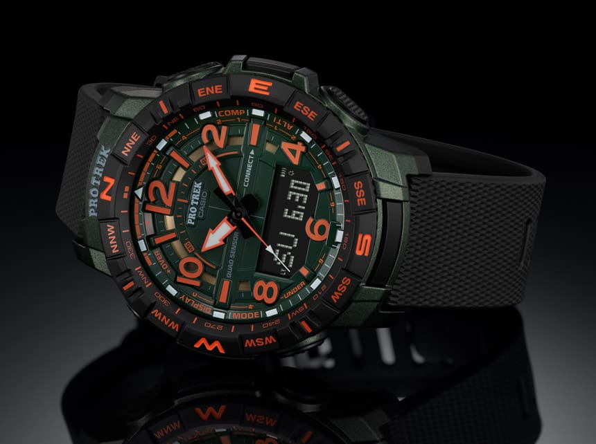 Un reloj de pulsera negro Bluetooth® de la serie Pro Trek PRT-B50 de Casio con números rojos sobre una superficie negra brillante