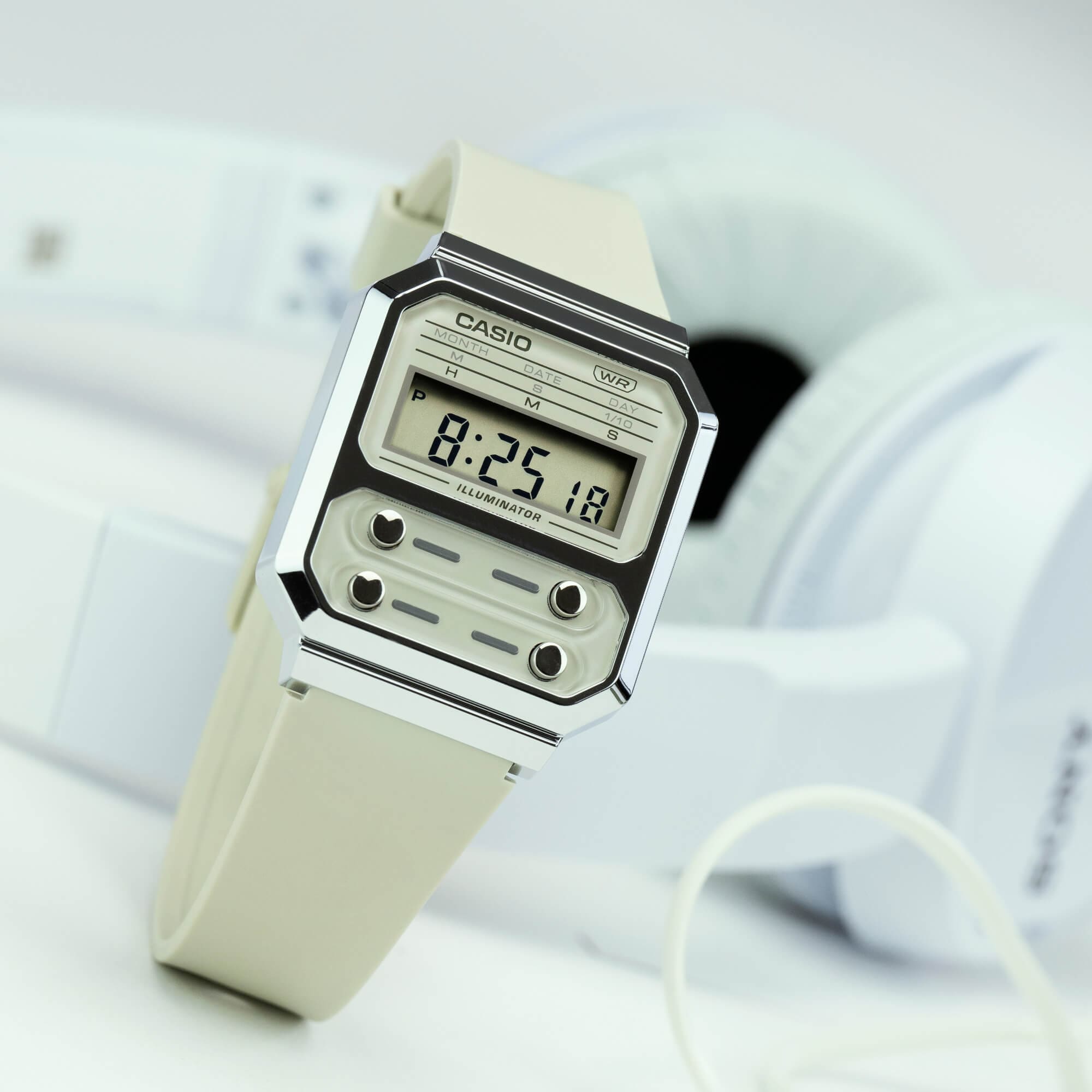 Imagen del producto A100WEF-8AEF, detrás se pueden ver los auriculares blancos.