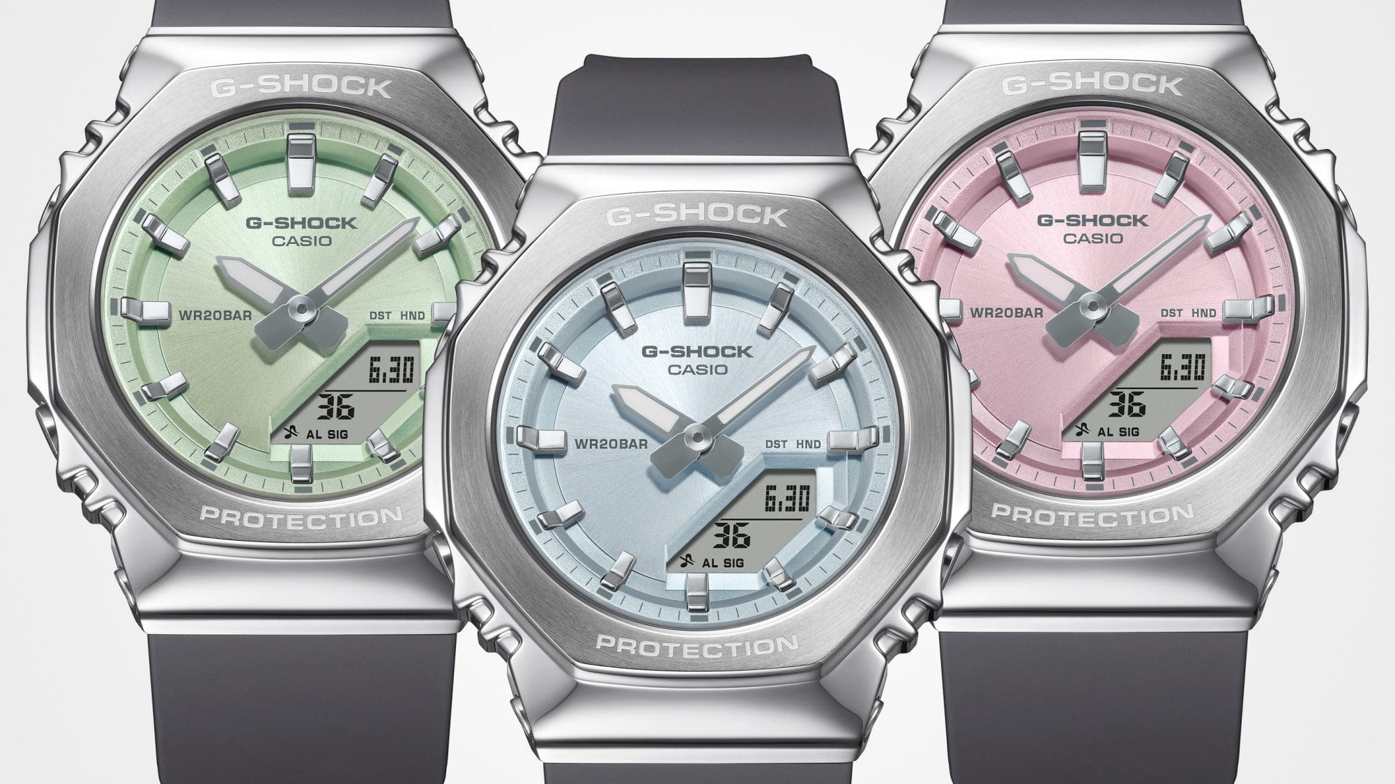 De gauche à droite : GM-S2110-3A, GM-S2110-2A, GM-S2110-4A Les trois variantes de couleur de la montre hybride GM-S2110 côte à côte : la GM-S2110-3A avec un cadran vert, la GM-S2110-2A avec un cadran bleu et la GM-S2110-4A avec un cadran rose