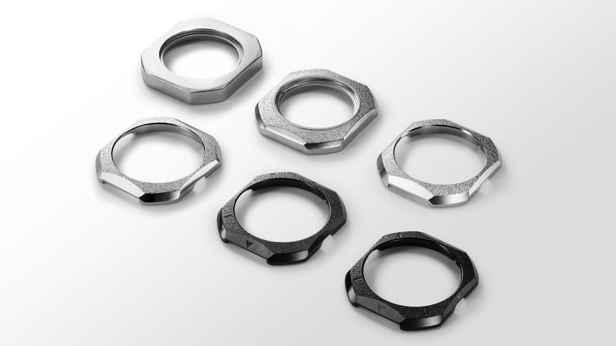 Textured bezel expressing the look of cast iron