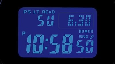 Het verlichte display van het digitale horloge