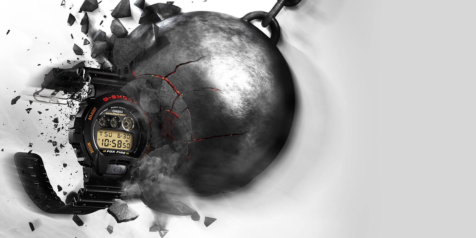 Uma bola de demolição esmaga um relógio de pulso G-Shock DW-6900B-9, que permanece incólume